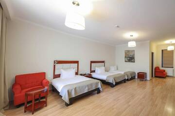 Стандартный трехместный номер в  Lopota Lake Resort & Spa